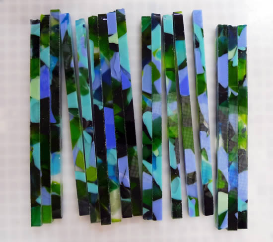 Glass slab cut into strips.