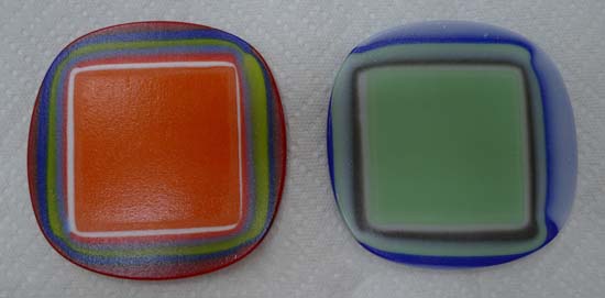 Upside-down fused glass puddles