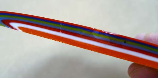 Fused glass puddle's edge